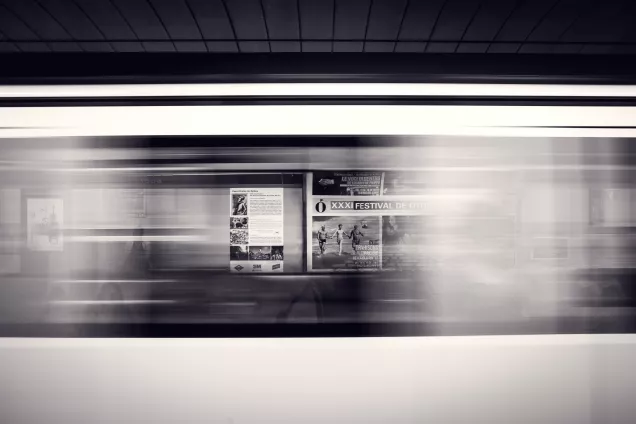 Blurry image of information on a street wall 